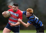 12 February 2023; Eoghan Moore of Mullingar is tackled by Shane McGuinness of Wexford Wanderers during the Bank of Ireland Provincial Towns Cup 1st Round match between Wexford Wanderers RFC and Mullingar RFC at Wexford Wanderers RFC in Wexford. Photo by Harry Murphy/Sportsfile