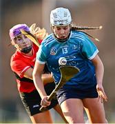 12 February 2023; Megan Dowdall of TUD in action against Meadhbh Ring of UCC during the Electric Ireland Ashbourne Cup Final between UCC and TUD at UCD in Dublin. Photo by Ben McShane/Sportsfile