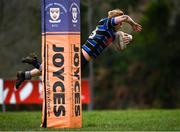 12 February 2023; Shane McGuinness of Wexford Wanderers dives over to score his side's fourth try during the Bank of Ireland Provincial Towns Cup 1st Round match between Wexford Wanderers RFC and Mullingar RFC at Wexford Wanderers RFC in Wexford. Photo by Harry Murphy/Sportsfile