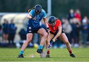12 February 2023; Kerrie Finnegan of TUD in action against Rachel McCarthy of UCC during the Electric Ireland Ashbourne Cup Final between UCC and TUD at UCD in Dublin. Photo by Ben McShane/Sportsfile