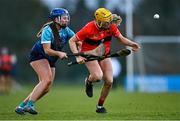 12 February 2023; Eimear Heffernan of UCC in action against Niamh Keenaghan of TUD during the Electric Ireland Ashbourne Cup Final between UCC and TUD at UCD in Dublin. Photo by Ben McShane/Sportsfile