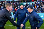 12 February 2023; Linesman Niall Malone shakes hands with Dublin manager Micheál Donoghue and Antrim manager Darren Gleeson after the Allianz Hurling League Division 1 Group B match between Dublin and Antrim at Parnell Park in Dublin. Photo by Ray McManus/Sportsfile