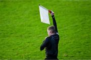 12 February 2023; Linesman Niall Malone advises the referee of a substitution during the Allianz Hurling League Division 1 Group B match between Dublin and Antrim at Parnell Park in Dublin. Photo by Ray McManus/Sportsfile