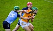 12 February 2023; Conal Bohill of Antrim is tackled by Fergal Whitely, 13, and Liam Murphy of Dublin during the Allianz Hurling League Division 1 Group B match between Dublin and Antrim at Parnell Park in Dublin. Photo by Ray McManus/Sportsfile