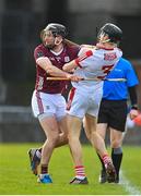 12 February 2023; Eoin Downey of Cork tussles with Padraic Mannion of Galway during the Allianz Hurling League Division 1 Group A match between Galway and Cork at Pearse Stadium in Galway. Photo by Seb Daly/Sportsfile