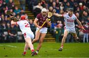 12 February 2023; Galway goalkeeper Darach Fahy in action against Conor O’Callaghan, left, and Eoin Downey of Cork during the Allianz Hurling League Division 1 Group A match between Galway and Cork at Pearse Stadium in Galway. Photo by Seb Daly/Sportsfile