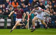 12 February 2023; Kevin Cooney of Galway in action against Eoin Downey of Cork during the Allianz Hurling League Division 1 Group A match between Galway and Cork at Pearse Stadium in Galway. Photo by Seb Daly/Sportsfile
