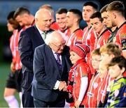 10 February 2023; President of Ireland Michael D Higgins in the company of FAI President Gerry McAnaney meet the Derry City players and mascots before the FAI President's Cup match between Derry City and Shamrock Rovers at the Ryan McBride Brandywell Stadium in Derry. Photo by Stephen McCarthy/Sportsfile