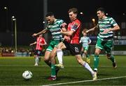 10 February 2023; Matthew Ward of Derry City in action against Roberto Lopes, left, and Aaron Greene of Shamrock Rovers during the FAI President's Cup match between Derry City and Shamrock Rovers at the Ryan McBride Brandywell Stadium in Derry. Photo by Stephen McCarthy/Sportsfile