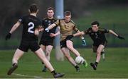 14 February 2023; Shane Allen of TUS Midlands in action against TUS Midwest players Ciaran McMahon, Sean McNamara and Patrick Doherty during the Electric Ireland HE Trench Cup Semi-Final match between TUS Midlands and TUS Midwest at SETU West Campus in Waterford. Photo by Brendan Moran/Sportsfile