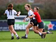 14 February 2023; Sorcha Tierney of Midlands is tackled by Lillian Brady of North East during the Leinster Rugby Bank of Ireland Sarah Robinson Cup Round Five match between Midlands and North East at Navan RFC in Navan, Meath. Photo by Piaras Ó Mídheach/Sportsfile