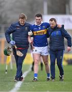 12 February 2023; Paddy Cadell of Tipperary is helped off the pitch to receive medical attention for an injury during the Allianz Hurling League Division 1 Group B match between Kilkenny and Tipperary at UPMC Nowlan Park in Kilkenny. Photo by Piaras Ó Mídheach/Sportsfile