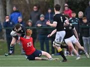 15 February 2023; Ben Barnes of Metro in action against Paddy Yourell of North East during the Leinster Rugby Shane Horgan Round Four match between Metro and North East at Skerries RFC in Skerries, Dublin. Photo by Piaras Ó Mídheach/Sportsfile