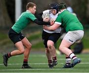 15 February 2023; Sean Nolan of Midlands in action against South East players James Curry, left, and Senan Keating during the Leinster Rugby Shane Horgan Round Four match between Midlands and South East at Skerries RFC in Skerries, Dublin. Photo by Piaras Ó Mídheach/Sportsfile