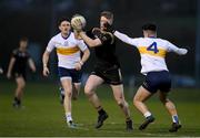 15 February 2023; Enda Maguire of TUS Midlands is tackled by Lee Rice of DKIT during the Electric Ireland HE Trench Cup Final match between Dundalk Institute of Technology and Technological University of the Shannon Midlands at SETU West Campus in Waterford. Photo by Brendan Moran/Sportsfile
