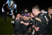 15 February 2023; TUS Mdlands captain Shane Allen, left, and Matthew Whittaker and teammates celebrate with the cup after victory in the Electric Ireland HE Trench Cup Final match between Dundalk Institute of Technology and Technological University of the Shannon Midlands at SETU West Campus in Waterford. Photo by Brendan Moran/Sportsfile