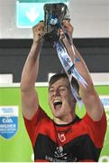 15 February 2023; UCC captain Jack Murphy lifts the cup after the Electric Ireland HE GAA Sigerson Cup Final match between University of Limerick and University College Cork at WIT Sports Campus in Waterford. Photo by Brendan Moran/Sportsfile