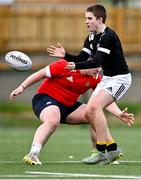 15 February 2023; Jamie Carr of Metro in action against Thomas Kearns of North East during the Leinster Rugby Shane Horgan Round Four match between Metro and North East at Skerries RFC in Skerries, Dublin. Photo by Piaras Ó Mídheach/Sportsfile