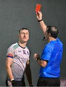15 February 2023; Emmett McMahon of UL is shown a red card by referee Sean Hurson during the Electric Ireland HE GAA Sigerson Cup Final match between University of Limerick and University College Cork at WIT Sports Campus in Waterford. Photo by Stephen Marken/Sportsfile
