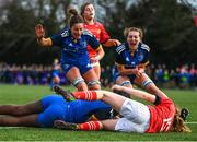 16 February 2023; Alma Obehi Atagamen of Leinster scores her side's first try as teammates Georgia Young and Anna Mai O'Brien celebrate during the U18 Girls Interprovincial match between Leinster and Munster at Terenure College in Dublin. Photo by Harry Murphy/Sportsfile