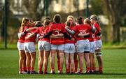 16 February 2023; Munster players huddle during the U18 Girls Interprovincial match between Leinster and Munster at Terenure College in Dublin. Photo by Harry Murphy/Sportsfile