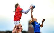 16 February 2023; Saskia Wycherley of Munster wins possession in the lineout against Orla Wafer of Leinster during the U18 Girls Interprovincial match between Leinster and Munster at Terenure College in Dublin. Photo by Harry Murphy/Sportsfile