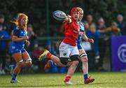 16 February 2023; Clodagh O'Keeffe of Munster offloads during the U18 Girls Interprovincial match between Leinster and Munster at Terenure College in Dublin. Photo by Harry Murphy/Sportsfile