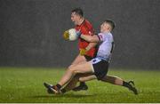 15 February 2023; Michael O'Gara of UCC is tackled by Colm Moriarty of UL during the Electric Ireland HE GAA Sigerson Cup Final match between University of Limerick and University College Cork at WIT Sports Campus in Waterford. Photo by Brendan Moran/Sportsfile