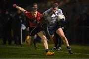 15 February 2023; Mark Lenehan of UL in action against Bill Curtin of UCC during the Electric Ireland HE GAA Sigerson Cup Final match between University of Limerick and University College Cork at WIT Sports Campus in Waterford. Photo by Brendan Moran/Sportsfile