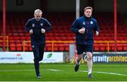 17 February 2023; Shelbourne manager Damien Duff, right, and coach Alan Quinn, run laps around the pitch before the SSE Airtricity Men's Premier Division match between Shelbourne and Drogheda United at Tolka Park in Dublin. Photo by Tyler Miller/Sportsfile