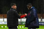 17 February 2023; Adam O'Reilly of Derry City, left, and Serge Atakayi of St Patrick's Athletic before the SSE Airtricity Men's Premier Division match between St Patrick's Athletic and Derry City at Richmond Park in Dublin. Photo by Seb Daly/Sportsfile