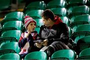 17 February 2023; Treaty United supporters Thomas Lynch and his son Tommy, age 8, before the SSE Airtricity Men's First Division match between Treaty United and Bray Wanderers at Market's Field in Limerick. Photo by Michael P Ryan/Sportsfile