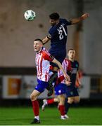 17 February 2023; Lee Devitt of Treaty United in action against Guillermo Almirall of Bray Wanderers  during the SSE Airtricity Men's First Division match between Treaty United and Bray Wanderers at Market's Field in Limerick. Photo by Michael P Ryan/Sportsfile