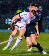 17 February 2023; James Hume of Ulster is tackled by Tom Jordan of Glasgow Warriors during the United Rugby Championship match between Glasgow Warriors and Ulster at Scotstoun Stadium in Glasgow, Scotland. Photo by Paul Devlin/Sportsfile