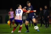 17 February 2023; Jake Walker of Bray Wanderers in action against Dean George of Treaty United during the SSE Airtricity Men's First Division match between Treaty United and Bray Wanderers at Market's Field in Limerick. Photo by Michael P Ryan/Sportsfile