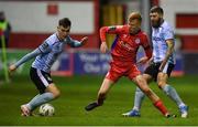 17 February 2023; Evan Weir of Drogheda United in action against Shane Farrell of Shelbourne during the SSE Airtricity Men's Premier Division match between Shelbourne and Drogheda United at Tolka Park in Dublin. Photo by Tyler Miller/Sportsfile