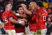 17 February 2023; Joey Carbery of Munster, second left, celebrates with teammates Shane Daly, Simon Zebo and Antoine Frisch after scoring his side's fourth try during the United Rugby Championship match between Munster and Ospreys at Thomond Park in Limerick. Photo by Harry Murphy/Sportsfile
