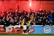 17 February 2023; Derry City supporters celebrates theirside first goal, scored by Jordan McEneff, during the SSE Airtricity Men's Premier Division match between St Patrick's Athletic and Derry City at Richmond Park in Dublin. Photo by Seb Daly/Sportsfile