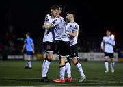 17 February 2023; John Martin of Dundalk celebrates with teammate Louis Annesley, left, after scoring their side's first goal during the SSE Airtricity Men's Premier Division match between Dundalk and UCD at Oriel Park in Dundalk, Louth. Photo by Ben McShane/Sportsfile