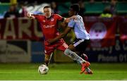 17 February 2023; Jack Moylan of Shelbourne is tackled by Elicha Ahui of Drogheda United during the SSE Airtricity Men's Premier Division match between Shelbourne and Drogheda United at Tolka Park in Dublin. Photo by Tyler Miller/Sportsfile