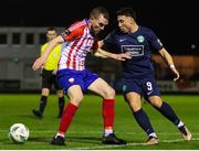 17 February 2023; Ben O'Riordan of Treaty United in action against Chris Lyons of Bray Wanderers during the SSE Airtricity Men's First Division match between Treaty United and Bray Wanderers at Market's Field in Limerick. Photo by Michael P Ryan/Sportsfile