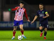 17 February 2023; Enda Curran of Treaty United in action against Dane Massey of Bray Wanderers during the SSE Airtricity Men's First Division match between Treaty United and Bray Wanderers at Market's Field in Limerick. Photo by Michael P Ryan/Sportsfile