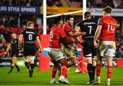 17 February 2023; Paddy Patterson of Munster, centre, celebrates with team-mates Malakai Fekitoa, left, and Liam Coombes, right, after scoring his side's fifth try during the United Rugby Championship match between Munster and Ospreys at Thomond Park in Limerick. Photo by Sam Barnes/Sportsfile