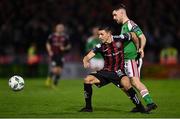 17 February 2023; Keith Buckley of Bohemians in action against Aaron Bolger of Cork City during the SSE Airtricity Men's Premier Division match between Cork City and Bohemians at Turner's Cross in Cork. Photo by Eóin Noonan/Sportsfile