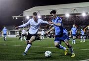 17 February 2023; Brendan Barr of UCD in action against Connor Malley of Dundalk during the SSE Airtricity Men's Premier Division match between Dundalk and UCD at Oriel Park in Dundalk, Louth. Photo by Ben McShane/Sportsfile