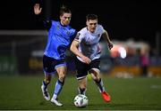 17 February 2023; John Martin of Dundalk in action against Daniel Norris of UCD during the SSE Airtricity Men's Premier Division match between Dundalk and UCD at Oriel Park in Dundalk, Louth. Photo by Ben McShane/Sportsfile