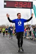 18 February 2023; RTÉ broadcaster Ryan Tubridy crosses the finish line after participating in the Operation Transformation 5K at Phoenix Park in Dublin. Photo by Tyler Miller/Sportsfile