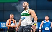 18 February 2023; Eric Favors of Raheny Shamrock AC, Dublin, celebrates a throw whilst competing in the senior men's Shot put during day one of the 123.ie National Senior Indoor Championships at National Indoor Arena in Dublin. Photo by Sam Barnes/Sportsfile