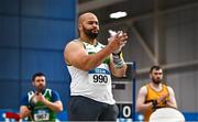 18 February 2023; Eric Favors of Raheny Shamrock AC, Dublin, celebrates a throw whilst competing in the senior men's shot put during day one of the 123.ie National Senior Indoor Championships at National Indoor Arena in Dublin. Photo by Sam Barnes/Sportsfile