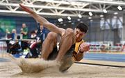 18 February 2023; Sam Healy of Leevale AC, Cork, on his way to winning the senior men's Long Jump   during day one of the 123.ie National Senior Indoor Championships at National Indoor Arena in Dublin. Photo by Sam Barnes/Sportsfile